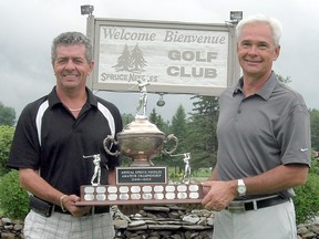 One of Northern Ontario's premier golf events, the Spruce Needles Men's Amateur Golf Tournament, is set to tee off this weekend in Timmins. The championship trophy for the tournament is displayed by Denis Morin, general manager of Spruce Needles Golf Course, left, and Ben Aube, president of Spruce Needles.