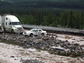 The Spruce Grove and Stony Plain RCMP have spent the last two weeks helping with efforts in High River. From visiting evacuation centres to going through houses, the officers aided in every aspect of the flood relief efforts. Now that residents are starting to return, local RCMP still had seven officers in High River as of July 3, all of whom are set to return by the end of the week. The officers are generally being sent down for between five and seven days. - Photo Submitted