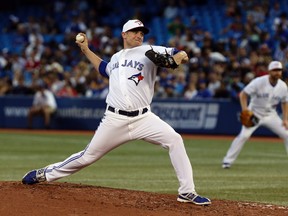 Toronto Blue Jays pitcher Neil Wagner throws during MLB action against the Detroit Tigers at the Rogers Centre in Toronto, Ont., July 4,2013. (DAVE THOMAS/QMI Agency)