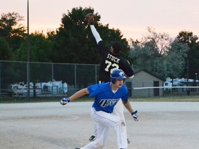 Ben Underwood of the Blue Devils made it to first base after he bunted the ball off a pitch by the Owen Sound Selects pitcher in the bottom half of the third inning Wednesday (July 3, 2013) at Lakeview Park in Port Elgin. The Blue Devils won 4-3 to the Selects. TIFFANY WILSON /SHORELINE BEACON / QMI AGENCY