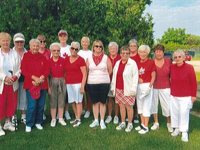 Pictured are the Holiday Golf ladies league all dressed in their red and white golf attire for their best ball tournament on July 2.