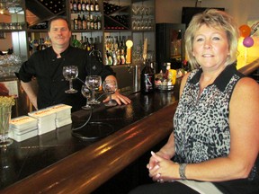 Chef Kevin McMillan and general manager Mary Lynn Kohut of the Quality Inn opened the new Crossroads Restaurant & Bar May 6.  Crossroads offers night time features like Wine-O Wednesdays where wine trees, like the one pictured here on the bar, are served for $10 each. (CATHY DOBSON, The Observer)