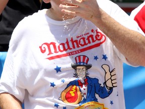 Joey Chestnut is pictured at Nathan's Famous Fourth of July Hot Dog-Eating Contest on July 4, 2013. WENN.com