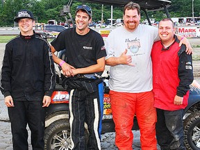 Custom Cart pole-sitters, from left, Tom Vance, Charlie Sandercock, Doug Anderson and Adam Whaley during the Brighton Automotive Canada Day championships.