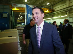 Ontario PC Leader Tim Hudak holds a press conference at Automatic Coating in Scarborough on July 4, 2013. (Stan Behal/Toronto Sun)