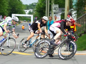 Richard Dagenais, pictured, heads into the last lap of the criterium race this past weekend at the Canadian Cycling Championship in Lac Megantic. The optimum position opened an opportunity for him to finish in second place.