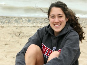 Triple jumper Danielle Quinn poses at Canatara Beach in Sarnia, Ont. on July 2, 2013 after committing to the University of Indiana. (PAUL OWEN, The Observer)