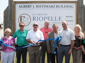 The Riopelle Group opened up its South Porcupine office in the former operations of Albert J. Ristimaki on Thursday. The new facility, named for the beloved lawyer, prospector and former councillor will serve the East End just as he had. From left are David Foster, Janice Kulik, Pierre Lambert-Belanger, Mayor Tom Laughren, Gord Conley, Coun. John Curley, Robert Riopelle, Sherry Bellemare and Dominique Lambert.