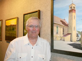 Greg Sloggett is this month’s featured artist at the gallery in Le Centre culturel La Ronde. If the church in the painting to his left looks familiar to Timmins residents, it is because it is a portrait of the Nativity of Our Lord Parish on Spruce Street North.