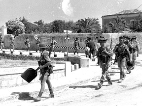 Troops of the Loyal Edmonton Regiment enter Modica in Sicily