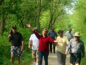 Vera Skitch shows the typical spirit of the Beckett Walkers on one of the Brantford area trails. Others, left to right are Les Payne, Jasmine Ford-Payne and Gerry Martin. (Photo by SHELIA SMITH)