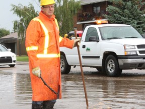 Crews from the City of Melfort tried to take care of the flood on McKencry Ave. and Main Street on Friday afternoon.