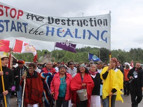 A group of First Nations Elders leads over 500 participants in the Tar Sands Healing Walk. Vincent McDermott/Today Staff