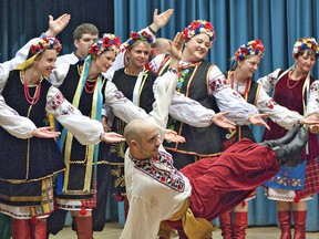 Members of the Reunion Dancers perform on Saturday evening, July 6, 2013 at Village Ukraina on Terrace Hill Street in Brantford.  As the Brantford International Villages marked its 40th year with record attendance, past members of the Ukraina dance groups decided to get together for a reunion performance. (BRIAN THOMPSON Brantford Expositor)