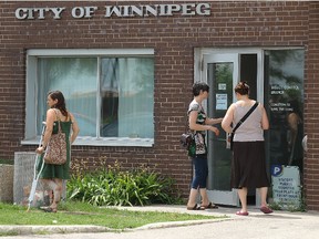 A steady stream of people registered for a buffer zone for mosquito fogging at an Insect Control Branch office on Waverley Avenue on Sun., July 7, 2013 in Winnipeg, Man. (KEVIN KING/Winnipeg Sun/QMI Agency)