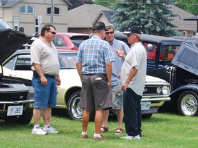 Friends met up at the Norwich Optimist car show Saturday held as part of the Nostalgia Days weekend.  (TARA BOWIE, Sentinel-Review)