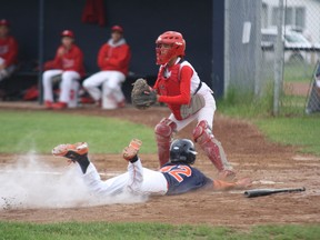 Ryan Mercer slides safely into home in the Bantam AAA Oil Giants’ 13-8 victory over the Lloydminster Twins Saturday.