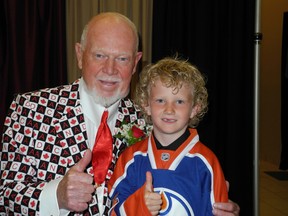 Fred Rinne/Daily Herald-Tribune
Legendary coach Don Cherry salutes seven-year-old Hudson Lamoureux of Grande Prairie prior to the Edge Academy Legacy Dinner Friday at the TEC Centre. Lamoureux donated almost $600 to Grande Prairie Minor Hockey to help kids who want play, but can’t afford registration. Grapes gave the Taylor Hall fan a big thumbs up!