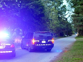 Norfolk OPP blocked off  a section of Woodstock Avenue in Long Point after receiving a call about a live explosive. Several cottages were evacuated for several hours as police investigated. The road was reopened at about 1:30 a.m. Monday after the item had been secured. (EDDIE CHAU Simcoe Reformer)