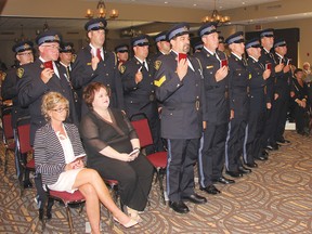 Members of the Pembroke Police Service are sworn in as members of the Ontario Provincial Police during a ceremony held at the Best Western Pembroke Inn and Conference Centre on Saturday morning. A total of 20 officers and two civilian employees joined the ranks of the OPP, as the service takes over policing duties in Pembroke. For more community photos, please visit our website photo gallery at www.thedailyobserver.ca.