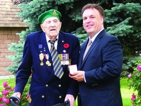 Second World War veteran Bill Nuttall was presented with the Minister of Veterans Affairs Commendation by MP Gord Brown at a ceremony last month.       Contributed photo