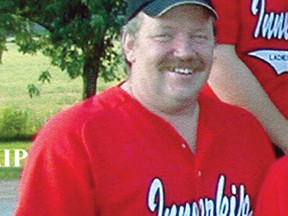 Since 2006, the Gord Marshall Ladies' Fastball Tournament has raised $110,000 for the Oxford County unit of the Canadian Cancer Society and become a premier women's fastball tournament. Gord Marshall, seen here in a 2002 photo when he was coach of the Innerkip ladies' fastball team, passed away Aug. 12, 2003 at 48 years old from cancer and was known for being a family man who loved sports. (Submitted photo)
