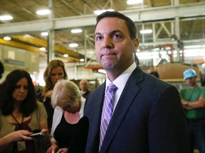Ontario PC leader Tim Hudak holds a press conference at  Automatic Coating , in Scarborough ,  July 4, 2013 this morning. (STAN BEHAL/QMI Agency)