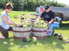 Volunteers for Melfort Communities in Bloom were out making Melfort more beautiful on Main Street and Wesley Street on Wednesday, July 3.