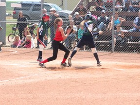 Pitcher Alexa Hangs works to cover the plate during the Melfort Heat’s 19-12 loss to the Kindersley Royals on Sunday, July 7 at Spruce Haven Ballpark as part of the 2013 Softball Saskatchewan “C” Girls Provincials