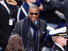 Recording artist Jay-Z arrives ahead swearing-in ceremonies for U.S. President Barack Obama on the West front of the U.S Capitol in Washington, January 21, 2013. (REUTERS/Kevin Lamarque)