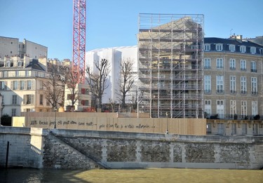 A photo taken on January 16, 2011 shows scaffolding and a crane at the renovation site of the 'Hotel Lambert' at the extreme tip of the Ile Saint-Louis in Paris. A major blaze destroyed on July 10, 2013 the 17th-century Lambert Hotel in central Paris, a private mansion that was bought by a Qatari prince in 2007, the fire service said. AFP PHOTO BERTRAND LANGLOIS