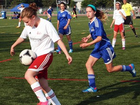 Belleville U14 Comets' Chloe Martineau intercepts a pass from a Cumberland Cobras player during East Region Soccer League play July 3 at M.A. Sills Park. The Comets won 1-0 for their first league victory of the season.