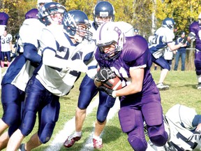 Beaver Brae linebacker Hudson Boucha tries his hand at offence on a fake punt during a game in 2011. Now the soon-to-be Grade 12 student is competing at the provincial level after being selected to the U18 Manitoba Provincial team.
FILE PHOTO/Daily Miner and News