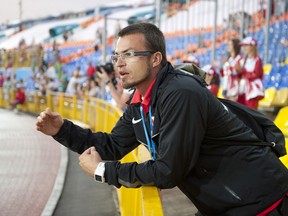 Wes Moerman cheers on Canadian athletes at the 2013 World University Games in Russia. MATT ZAMBONIN/Freestyle Photography