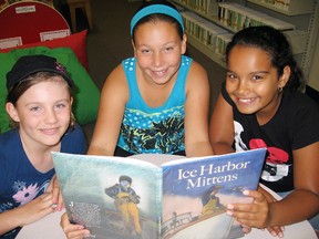 Area youth enjoying expanding their reading skills in this years Summer Reading Club at the Espanola Public Library.
Photo supplied