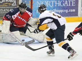 Former North Bay Jr. Trappers goalie Greg Dodds, in action against Kirkland Lake in March, is heading to the Western University in London to play for the Mustangs next fall. He's one of several NOJHL grads moving to higher levels of play.