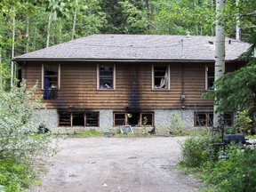 Fire gutted a Parks Canada staff accommodation building at the east Banff Park Gates in the early morning hours of Wednesday, July 10, 2013. The fire is believed to have started in the basement kitchen of the complex which was undergoing renovations after recent flooding in the area. Justin Parsons/ Canmore Leader/ QMI Agency