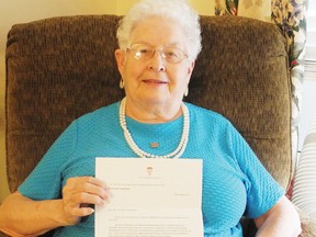 Lois McCartney proudly displays a letter she received in response to congratulations she sent to Prince William when he was married a couple of years ago. She plans to send a card when the royal couple’s first child arrives this month.
Staff photo/CHERYL BRINK