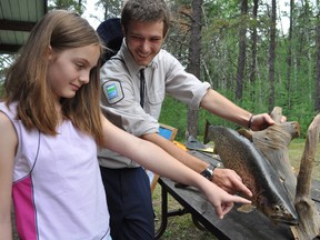 After a hiatus, Kettle Lakes Provincial Park is reinstating its popular Heritage Weekend events which combines recreational and educational programming. Back when this program was last offered in 2011, Kaitlyn St. Jacques, seen here received a lesson about fish during a workshop from Kettle Lakes Provincial Park natural heritage educator Phillipe Reid.
