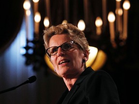 Ontario premier, Kathleen Wynne, delivers a speech to Canada 2020 on her plan to grow the economy by addressing regional infrastructure needs at the Chateau Laurier in Ottawa Wednesday, June 26, 2013. (Darren Brown/QMI Agency)