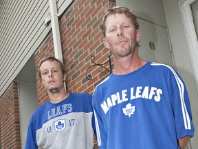 Travis Domoslai (left) and James MacKenzie of Memorial Drive in Brantford say they were brutalized and arrested by a Brantford Police officer on Tuesday evening, July 9, 2013. (BRIAN THOMPSON Brantford Expositor)