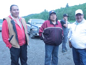Emergy Rollingmud, Larry Daniels and band councillor Reg Daniels are part of the crowd lined up at the Eden Valley Arena on July 8 to register for the provincial flood relief program following the June 20 flood.