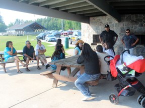 The mostly civilian supporters of the Treaty 3 Police Service sit in Anicinabe Park to discuss their next steps in trying to save the police force. 
ALAN S. HALE/Daily Miner and News