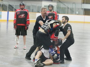 The final match of the regular season between the West Edmonton Blues and the Fort Saskatchewan Rebels was a chippy affair with over 100 minutes of penalties in the third period alone. Photo by Aaron Taylor.