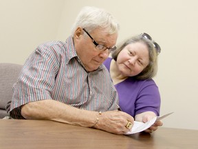 Roy and Juliana Langham are angry they have to pay $25 to move their medical records.
