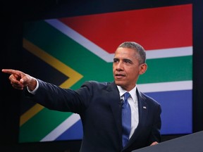 U.S. President Barack Obama leads a town-hall discussion with young African leaders in South Africa last month. Obama called climate changed an 'existential problem,' but the U.S. has no credible plan to lead the way forward.