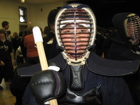 A student from Shikaoi in full Kendo uniform at a cultural display for host families during a previous visit by students from Japan. - Photo Submitted