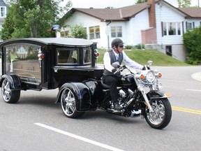 Harley hearse carries Richard Leroux to funeral service