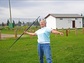 Ellzabeth McSheffrey/Daily Herald-Tribune
Grande Prairie athlete Eleanor Graw winds up for a lengthy javelin toss during practice at the Leisure Centre fields on Tuesday. This will be Graw’s second time participating in the Alberta Seniors Games after taking gold for the bowling event in winter 2012. At age 79, she will compete for the first time in the 100-metre sprint, javelin and discus throws after more than two months of practice.