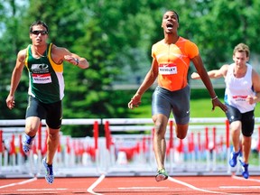 Matthew Brisson, pictured here in the left, at the Canadian Track and Field Championships in Calgary, Alberta. (File photo)